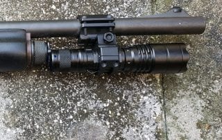 barrel mount with gun on sidewalk barrel mount with gun on sidewalk